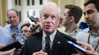 Wisconsin Senator Ron Johnson talks with reporters after the senate luncheons in the U.S. Capitol.
