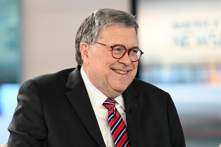 Bill Barr smiles
