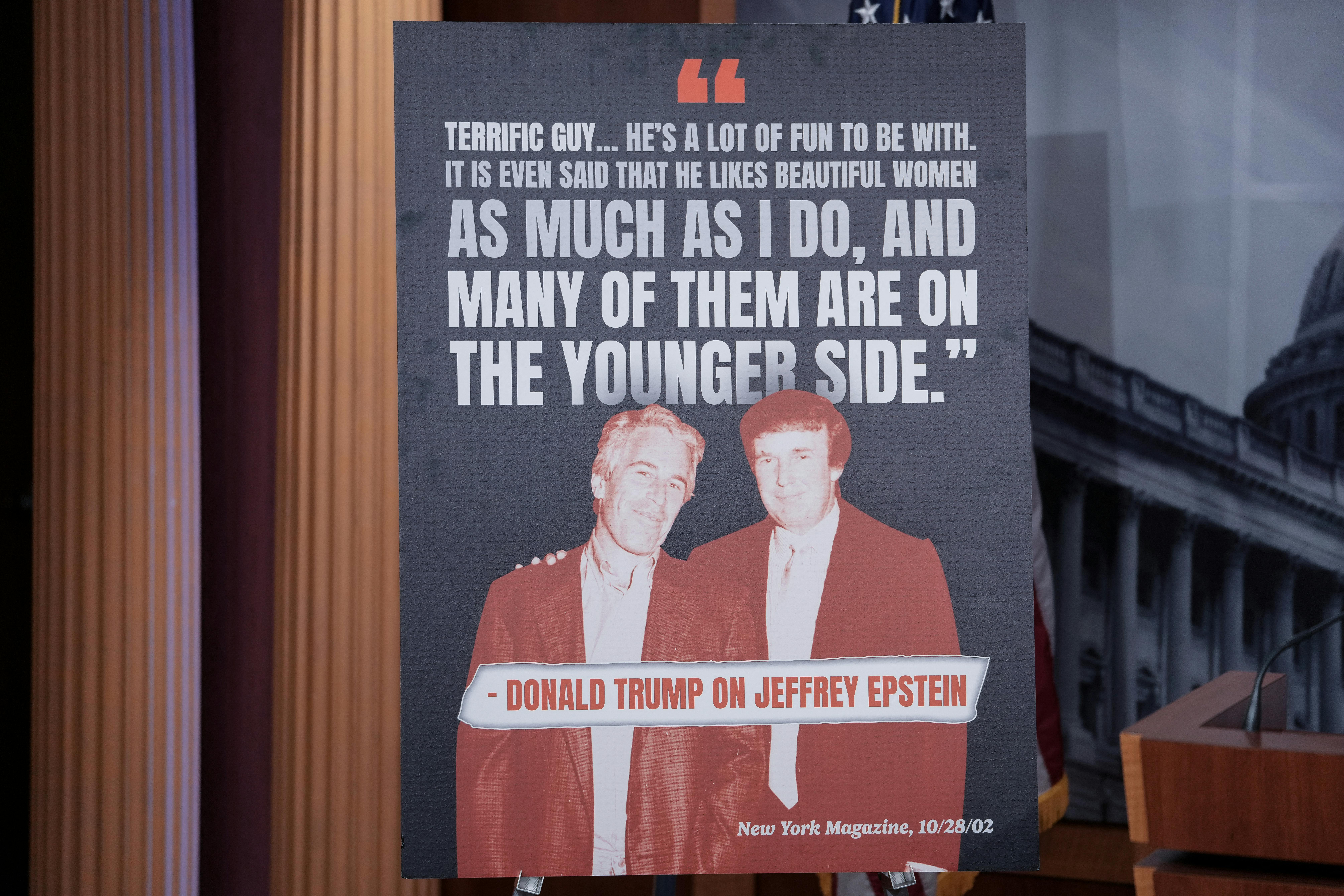Sign with Trump quote about Epstein: "Terrific guy... He's a lot of fun to be with. It is even said that he likes beautiful women as much as I do, and many of them are on the younger side." Old photo of the two of them smiling.