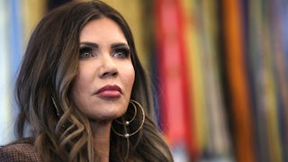 DHS Head Kristi Noem speaks in a hearing.