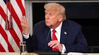 Donald Trump delivers remarks at the Invest America Roundtable in the State Dinning room at the White House.