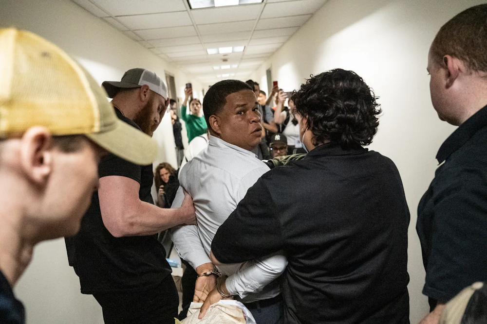 An immigrant is detained by ICE agents as he exits an immigration courtroom hearing at the Jacob K. Javits Federal Building on June 6, 2025 in New York City.