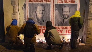 People attend a vigil for Renee Nicole Good and Alex Pretti