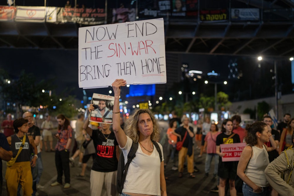 Protesters in Tel Aviv, Israel, after the announcement of the death of Hamas leader Yahya Sinwar