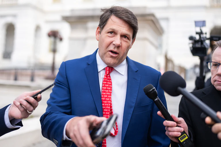 Representative Jodey Arrington speaks to reporters outside the Capitol.