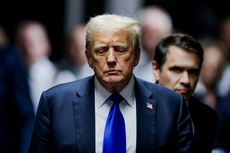 Donald Trump looks down