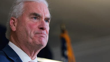 Representative Tom Emmer presses his lips together.