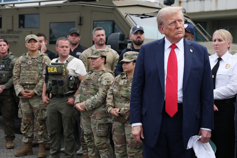 President Donald Trump stands with federal troops in Washington, D.C.