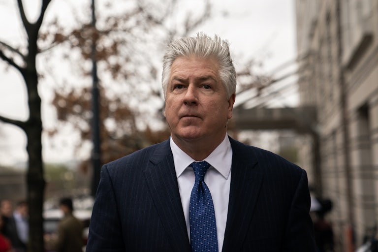 Evan Corcoran walks outside