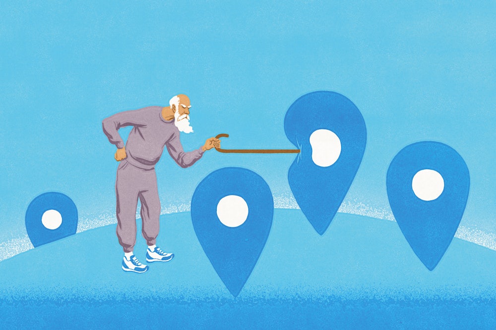 An elderly person is poking a locator, which represents a Blue Zone certification