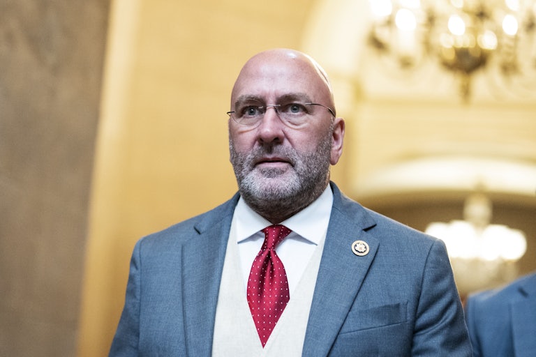 Representative Clay Higgins walks in the Capitol