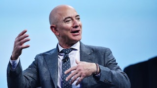 Washington Post owner Jeff Bezos gesticulates at a conference.