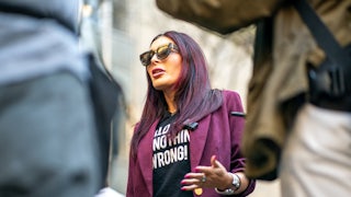 Laura Loomer speaks to a crowd