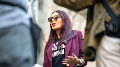 Laura Loomer speaks to a crowd