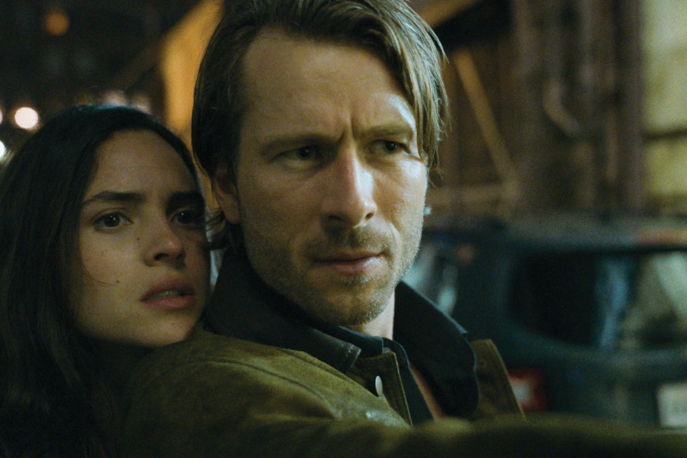 A close up of Adria Arjona and Glen Powell in Richard Linklater's film Hit Man