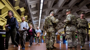 National Guard troops from South Carolina stand in Foggy Bottom Metro Station in Washington, D.C.