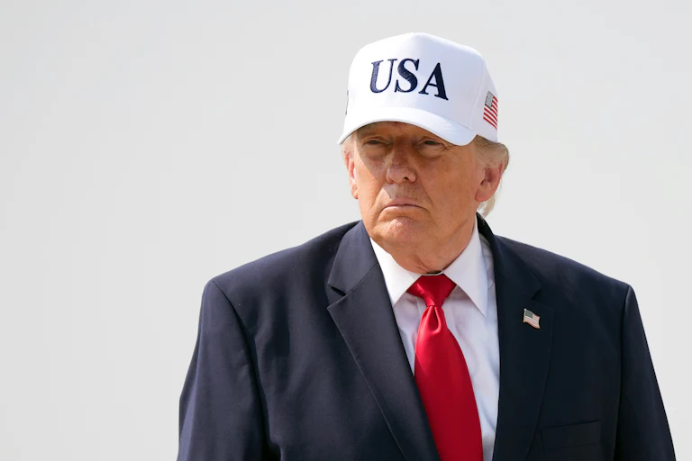 Donald Trump wearing a USA cap