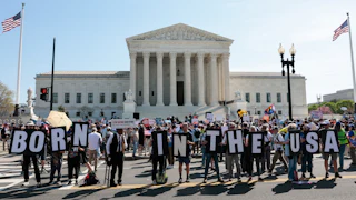 Demonstrators rally in support of birthright citizenship outside the U.S. Supreme Court.