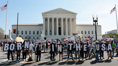 Demonstrators rally in support of birthright citizenship outside the U.S. Supreme Court.