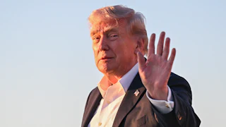 Donald Trump waves