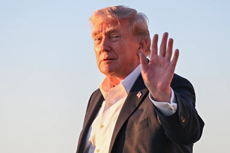 Donald Trump waves