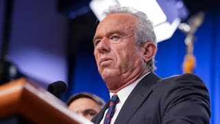 Robert F. Kennedy Jr. speaking at a podium