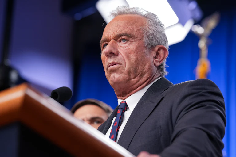 Robert F. Kennedy Jr. speaking at a podium
