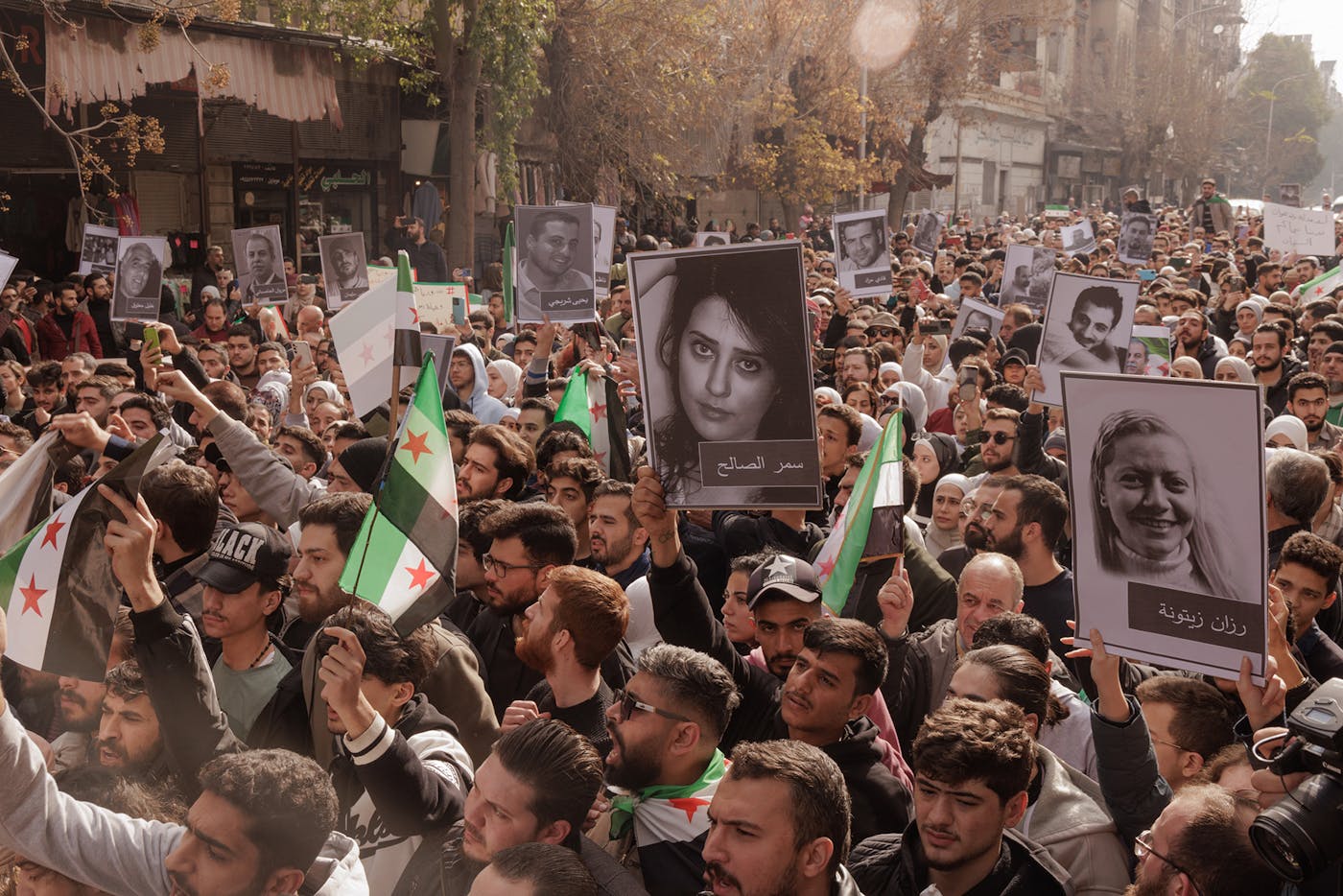 Near Damascus Hospital in the Syrian capital, people gather for a demonstration in memory of different activists, among them Mazem Al Hamadah, whose body was recently discovered inside Sednaya Prison. Mazem was detained by the Syrian regime for protesting against Assad during the Arab Spring. He was released in 2013 and given asylum in the Netherlands, but when he returned to Syria in 2020, he was detained again. Mazen was tortured to death around a week before the body was found. 