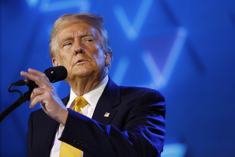 Donald Trump speaks at a mic