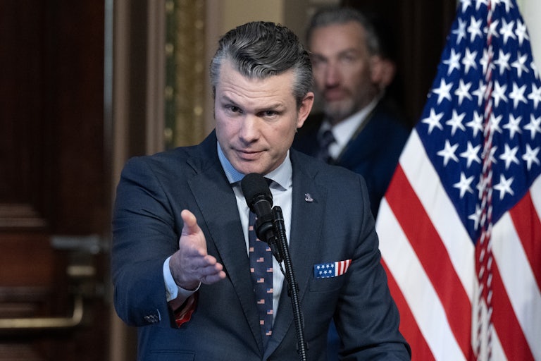 Pete Hegseth gestures while speaking to reporters after his swearing-in ceremony