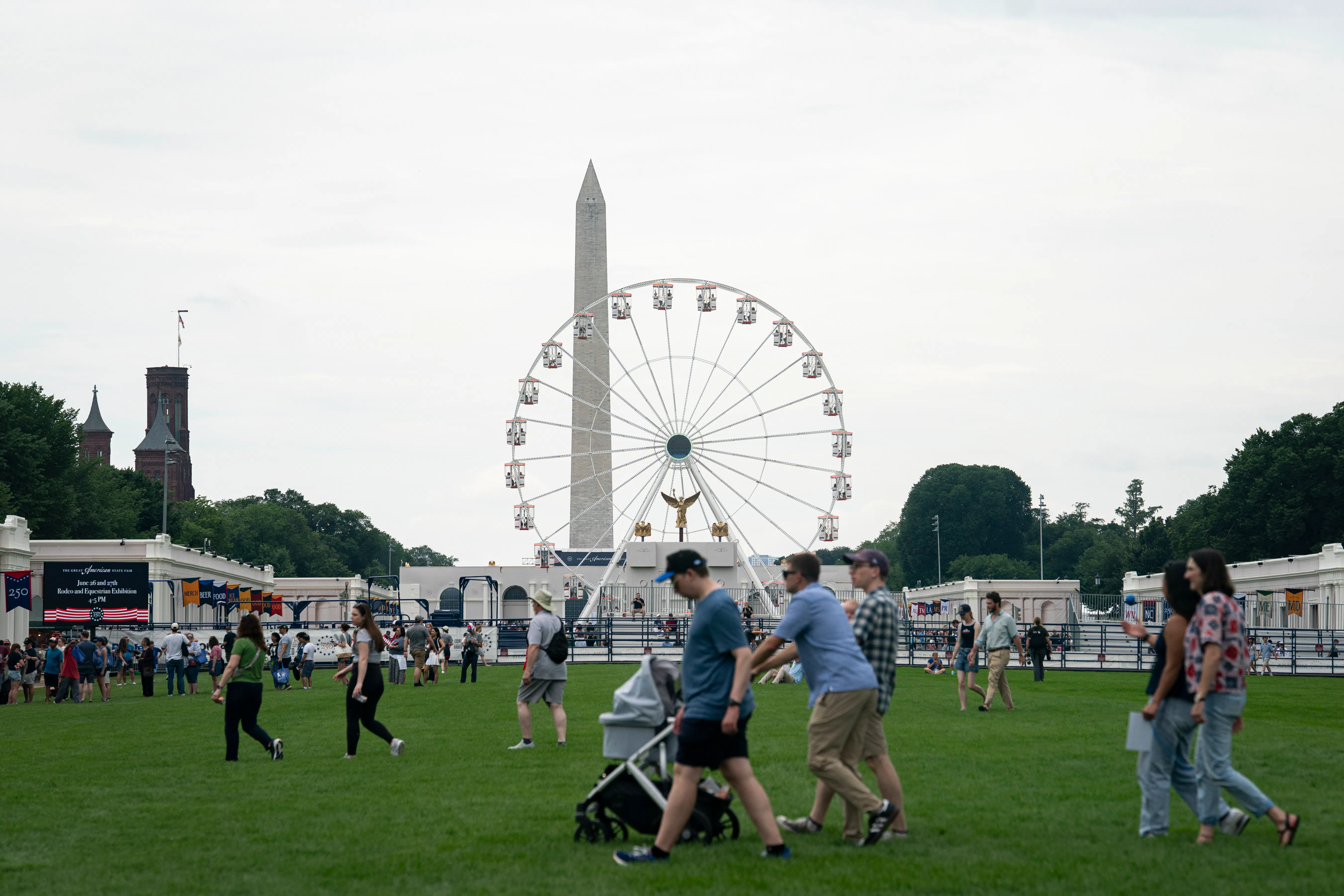 People walk at the Great American State Fair during the Freedom 250 celebrations