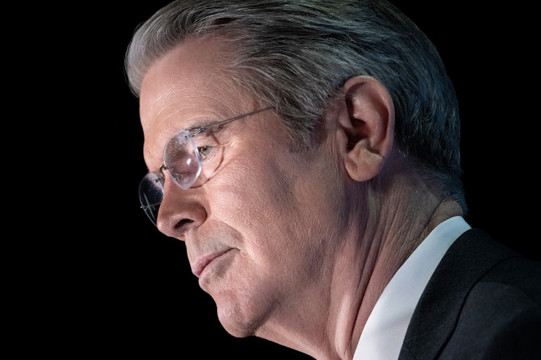 Treasury Secretary Scott Bessent stands with his profile to the camera