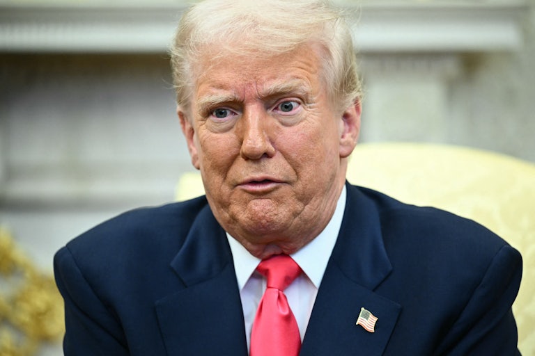 Donald Trump speaks to reporters in the Oval Office