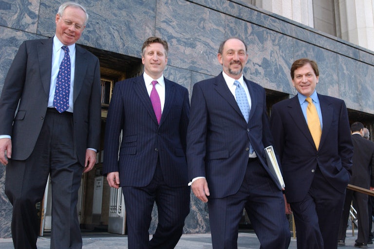 George J. Terwilliger, second from right, poses for a picture with his former colleagues at White & Case in 2005.