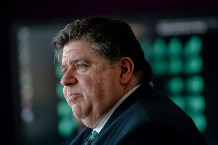 J.B. Pritzker is seen in profile