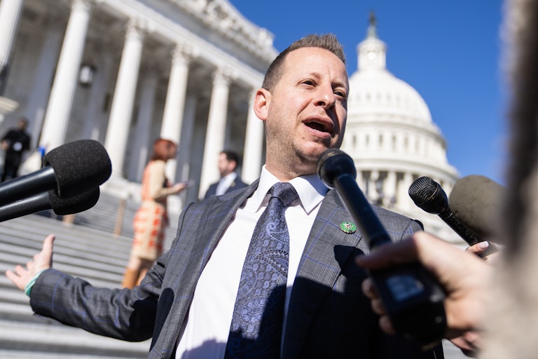 Jared Moskowitz speaks with reporters outside the Capitol