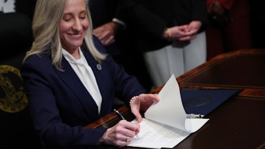 Virginia Governor Abigail Spanberger signs executive orders.