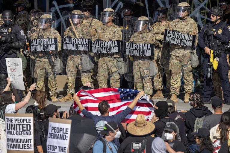 Protesters face off against National Guard troops in Los Angeles