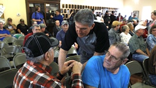 Manchin shakes hands with coal miners
