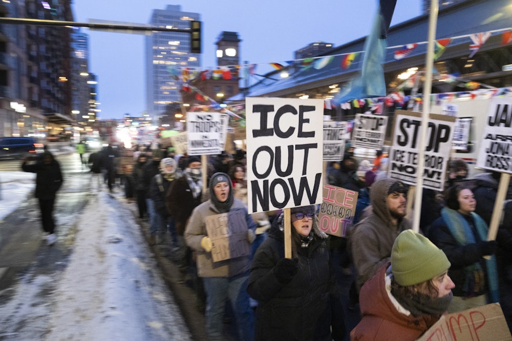 Demonstrators march during the nationwide “Stop ICE Terror” rally through downtown Minneapolis, Minnesota.