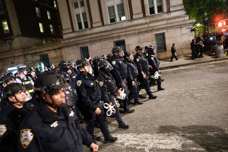 Police march on Columbia University's campus