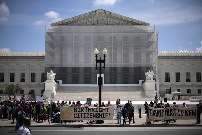 People protest in support of birthright citizenship outside the U.S. Supreme Court.