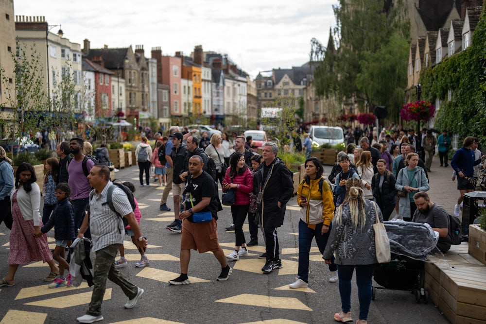 Oxford town center, people marching.