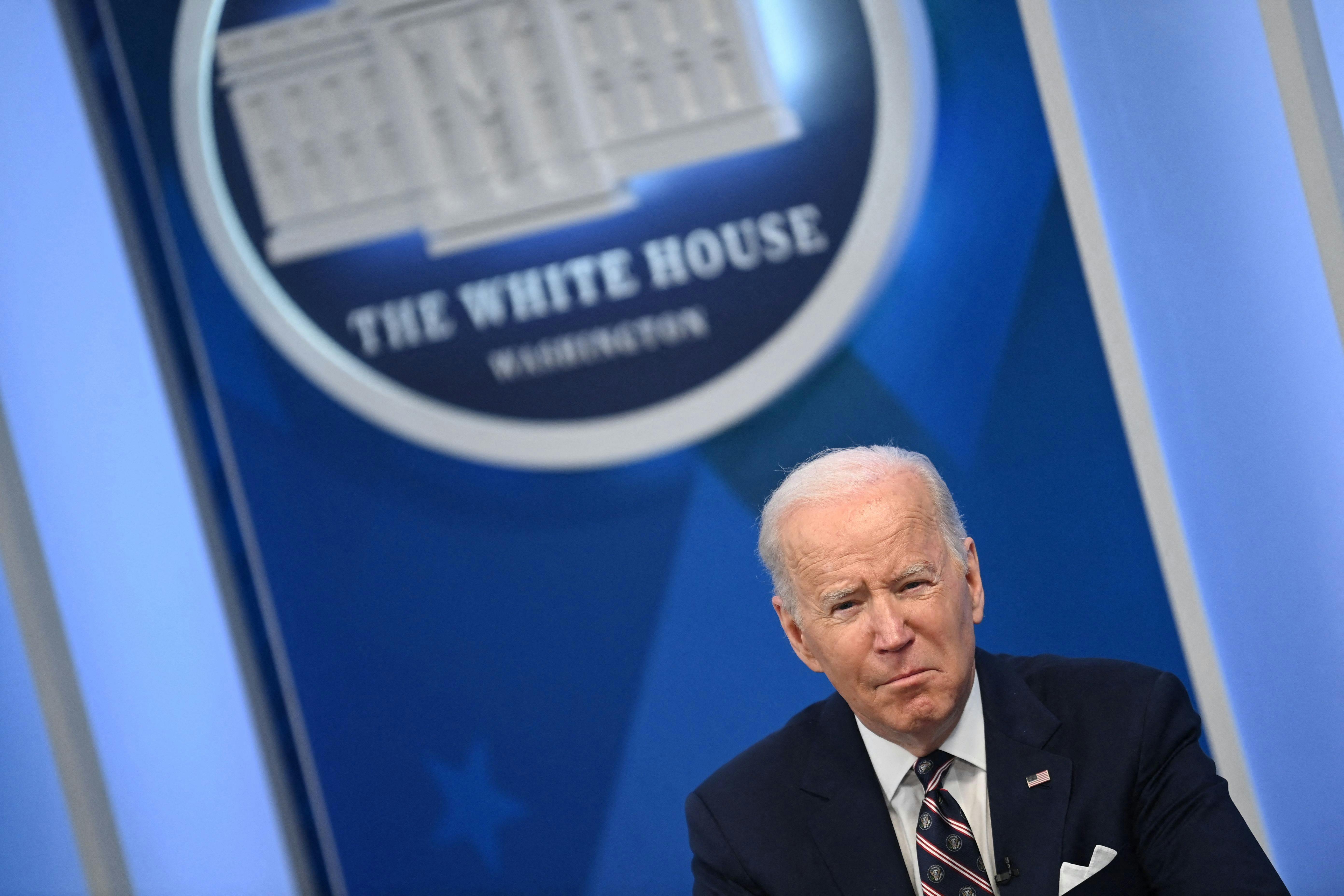 Joe Biden appears in the bottom corner of an angled shot.