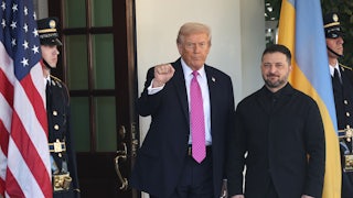 Donald Trump raises his fist while standing next to Ukrainian President Volodymyr Zelenskiy in front of the White House