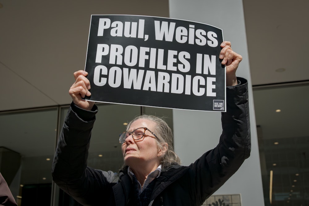 A protest last month outside the Manhattan offices of Paul Weiss