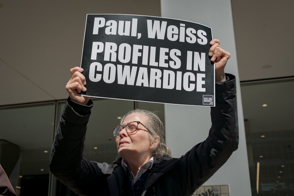 A protest last month outside the Manhattan offices of Paul Weiss