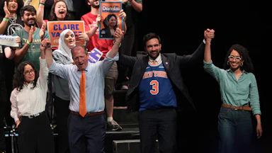 Congressional candidate Claire Valdez, Congressional candidate Brad Lander, Mayor Zohran Mamdani, and Congressional candidate Darializa Avila Chevalier raise their hands during a Get Out the Vote rally.