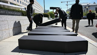 HIV advocates carrying mock coffins protest in front of the U.S. State Department, demanding the full restoration of United States President’s Emergency Plan for AIDS Relief, or PEPFAR, in Washington, D.C.