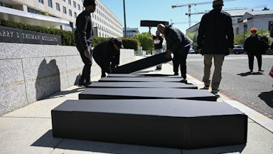 HIV advocates carrying mock coffins protest in front of the U.S. State Department, demanding the full restoration of United States President’s Emergency Plan for AIDS Relief, or PEPFAR, in Washington, D.C.